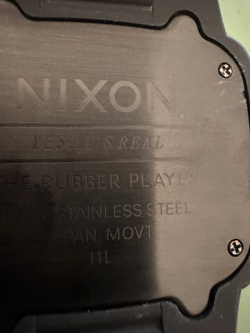 Nixon Rubber Player “Yes It’s Real”Black 100 M Square Watch Teal Hands